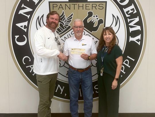 Pictured are Coach Jimmy Nix, head of school; Gary Beeland, Mississippi Construction Education Foundation central area director; and Michele Carter, counselor.
