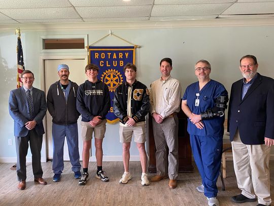 Pictured are John Martin (Rotary President), Chew, Lofton Harris, William Pace, Webster Ford (Rotary Vice President), De La Riva, and Tommy Sullivan (Rotarian).