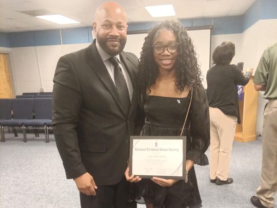 Lailan M. Hamlin, a junior at Canton Public School, is pictured with Michael Ellis, principal of Canton Career Center.