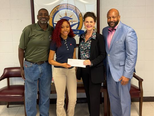 Pictured (l–r): Wayne Day, Collision Repair Instructor at CCC; Trenice Mayfield, Student at CCC; Jan Collins, MCBL&F; and Michael Ellis, Director at CCC.