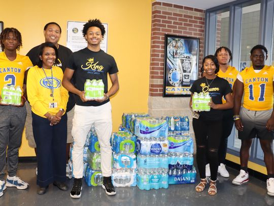 Canton High donates to rival school in need