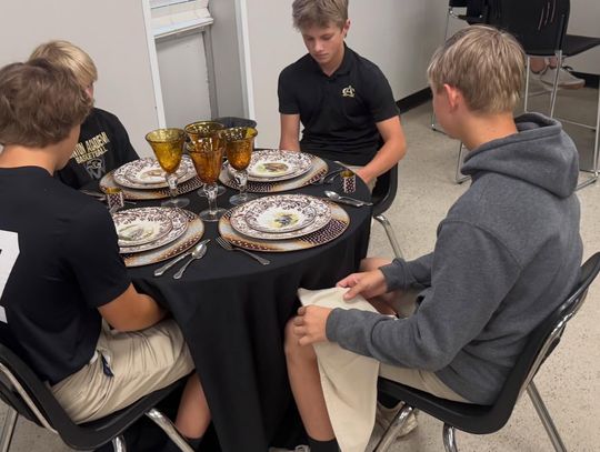 Dining etiquette lesson teaches students proper table manners