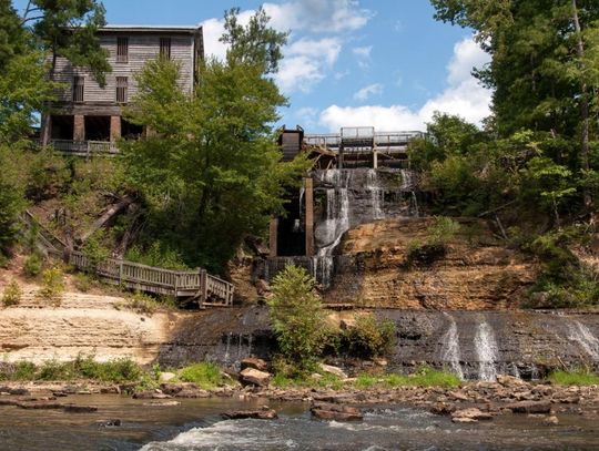 Dunn's Falls Water Park in Enterprise, MS, is one of the most scenic (and coolest!) places to visit during the summer.