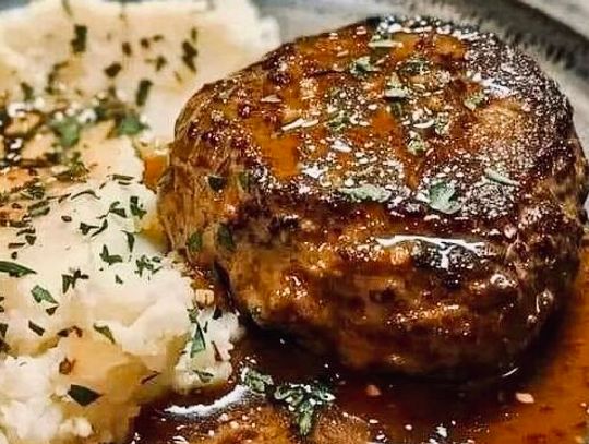 There’s no better comfort food than Salisbury steak served with a side of mashed potatoes and gravy.