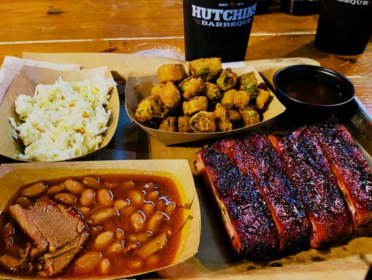 Delicious ribs, cole slaw, fried oka and barbecue beans at Hutchins BBQ in Frisco, Texas.