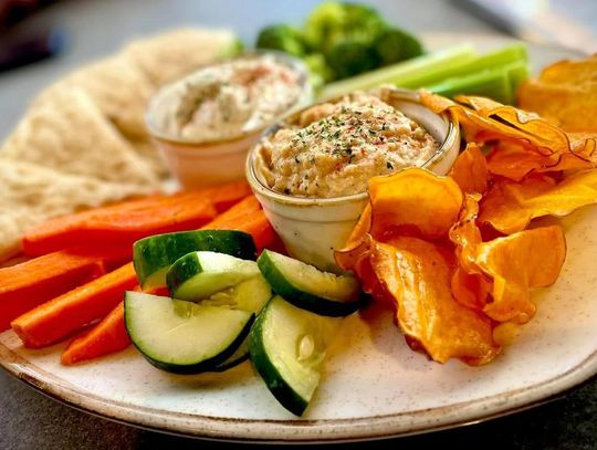 Greek dip duo at Keg and Barrel in Hattiesburg is a delicious combination of hummus and feta dip, homemade pita bread and chips and crisp vegetables.