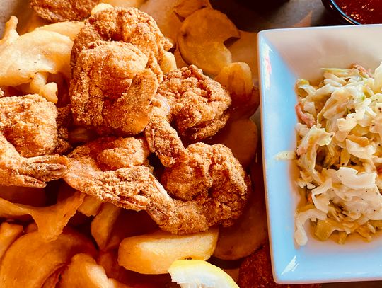 Smoked corn tartar sauce and tangy cocktail sauce, pictured top right, nearly stole the thunder from the delicious fried shrimp served at The Fish House in Pensacola, FL.