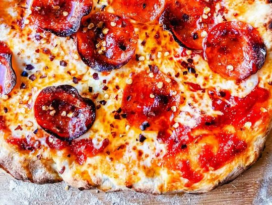 Homemade pepperoni pizza can be prepared and baked in minutes.