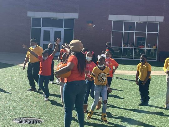 McNeal students kick for a homerun