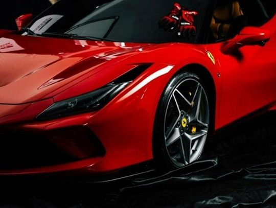 red luxury car in show room
