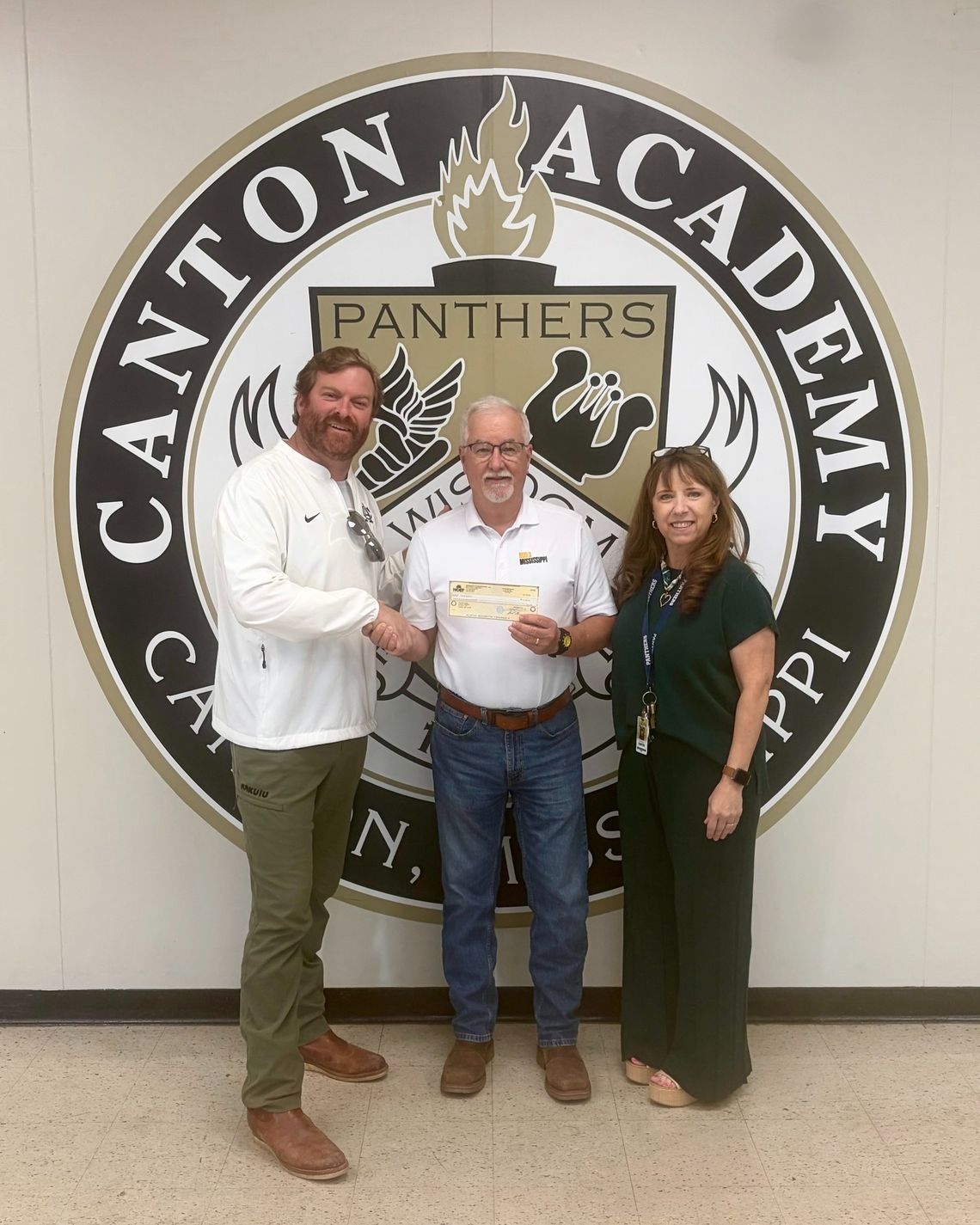 Build Mississippi investment expands skilled trades opportunities at CA Pictured are Coach Jimmy Nix, head of school; Gary Beeland, Mississippi Construction Education Foundation central area director; and Michele Carter, counselor.