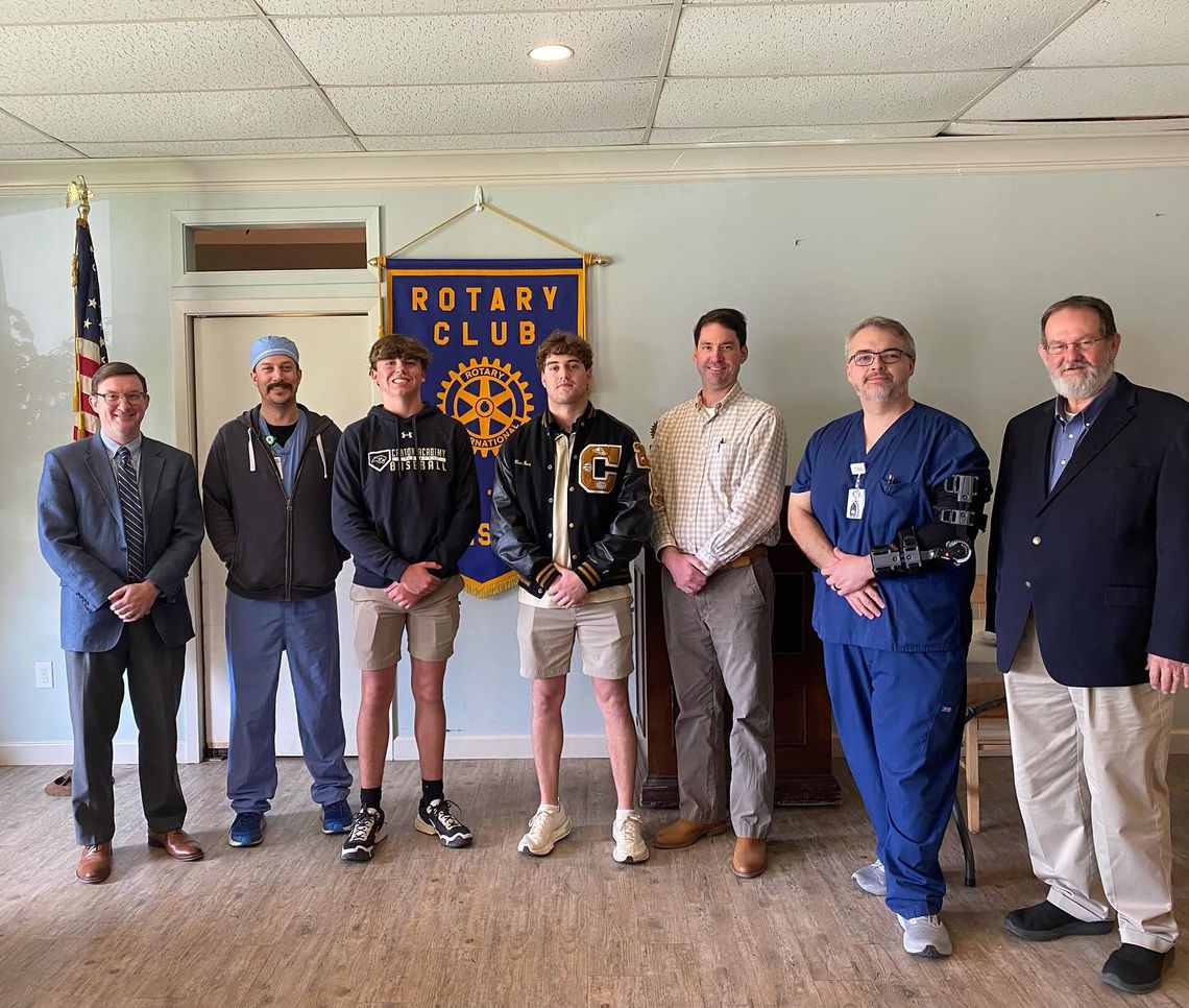 Pictured are John Martin (Rotary President), Chew, Lofton Harris, William Pace, Webster Ford (Rotary Vice President), De La Riva, and Tommy Sullivan (Rotarian).