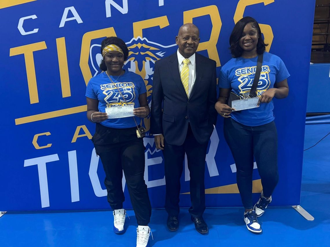 Canton alderman presents memorial scholarships to Canton High seniors