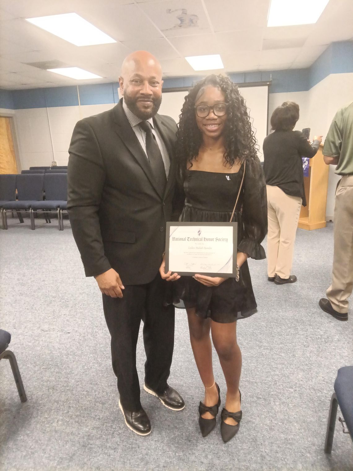 Lailan M. Hamlin, a junior at Canton Public School, is pictured with Michael Ellis, principal of Canton Career Center.