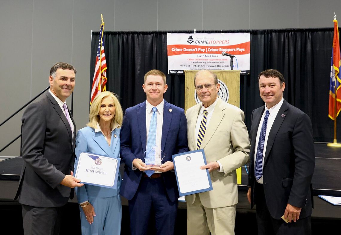 Cantonians Chisholm and Millican recently awarded Top Cop Nelson Chisholm