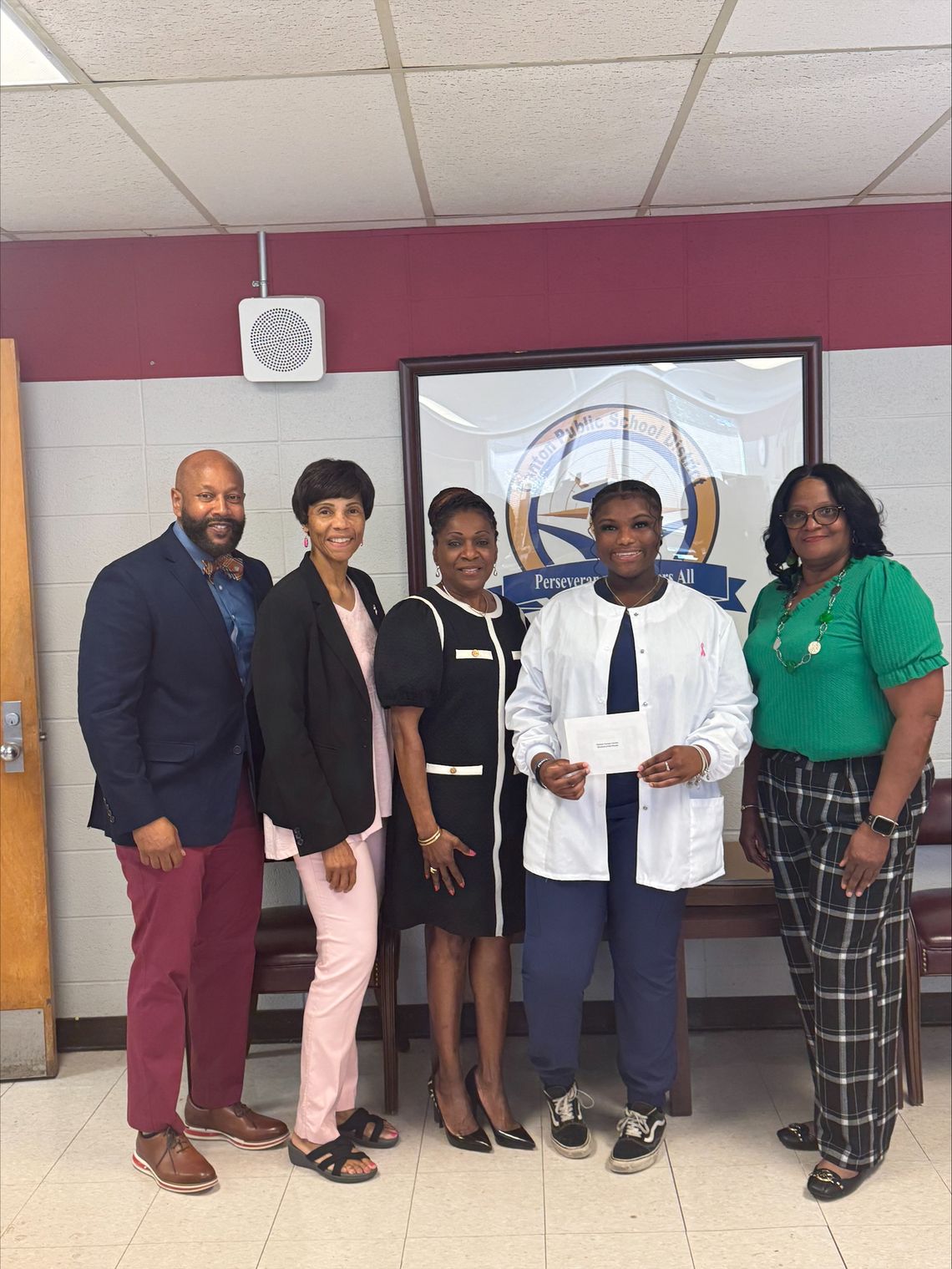 Health Science student named Canton Career Center honoree Pictured from left are Michael Ellis, Canton Career Center director; Dr. Sandra Fuqua; Rochelle Thompson, American Lung Association; Cornijah Woodruff, student of the month; and Shirley Jones, health science instructor.