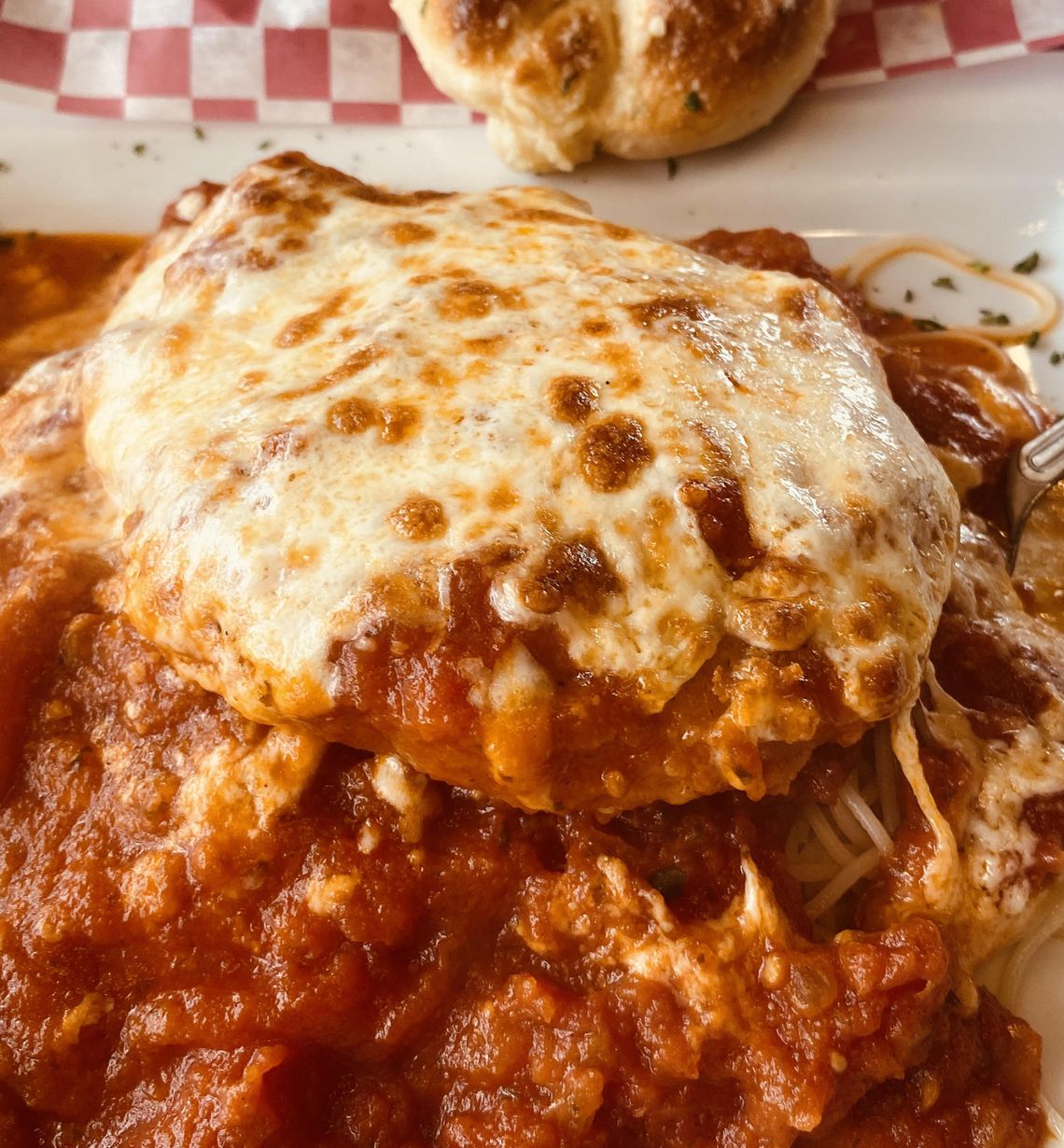 Chicken parmesan at Mario's Italian in Hattiesburg, pictured here, is one of the best dishes I've ever tasted. While I don't have the exact recipe, the printed recipe is similar to the ingredients used in Mario's dish and is quick and easy to make.