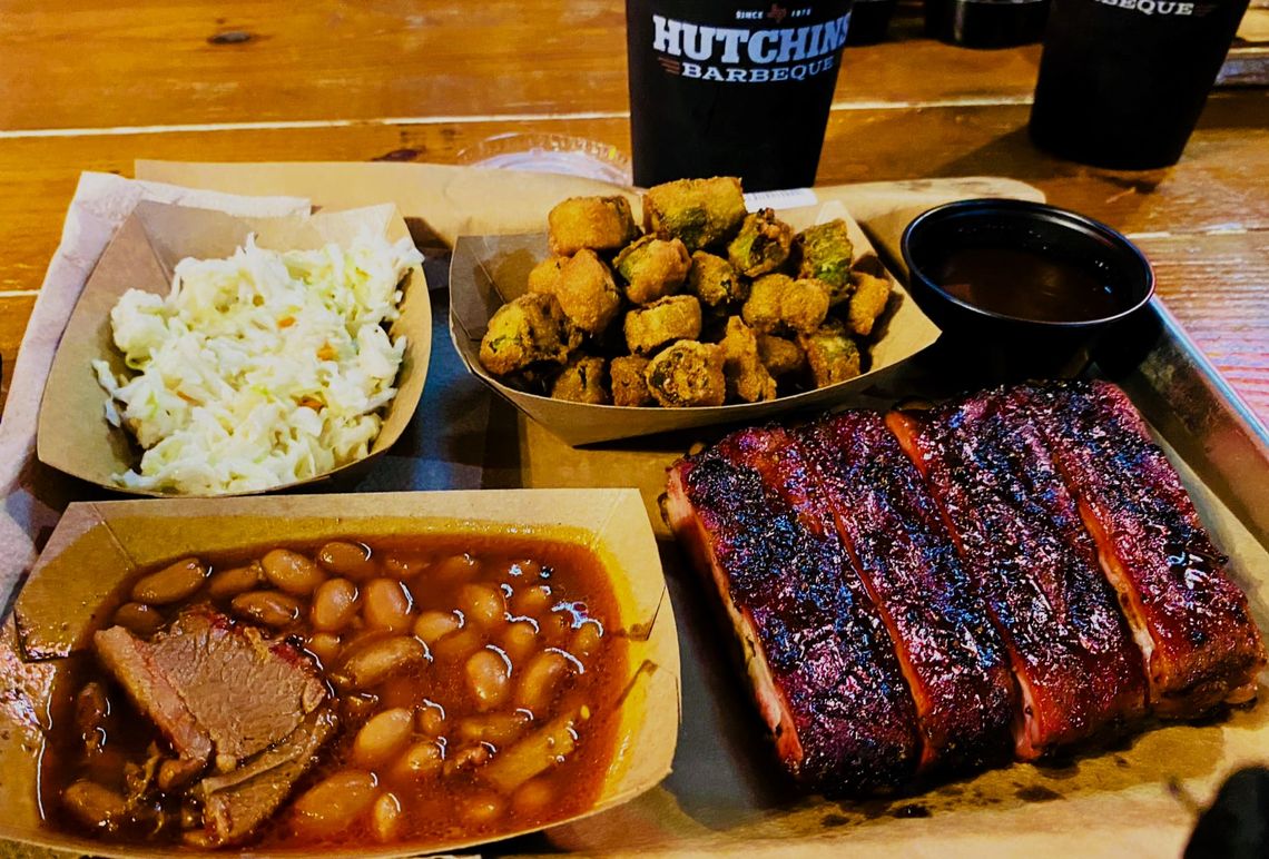 Delicious ribs, cole slaw, fried oka and barbecue beans at Hutchins BBQ in Frisco, Texas.