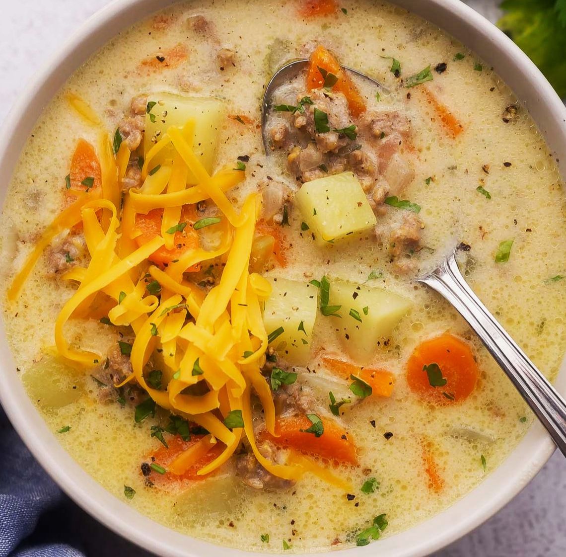 Easy Cheeseburger Soup provides the perfect transition from light summer meals to comforting fall dinners.