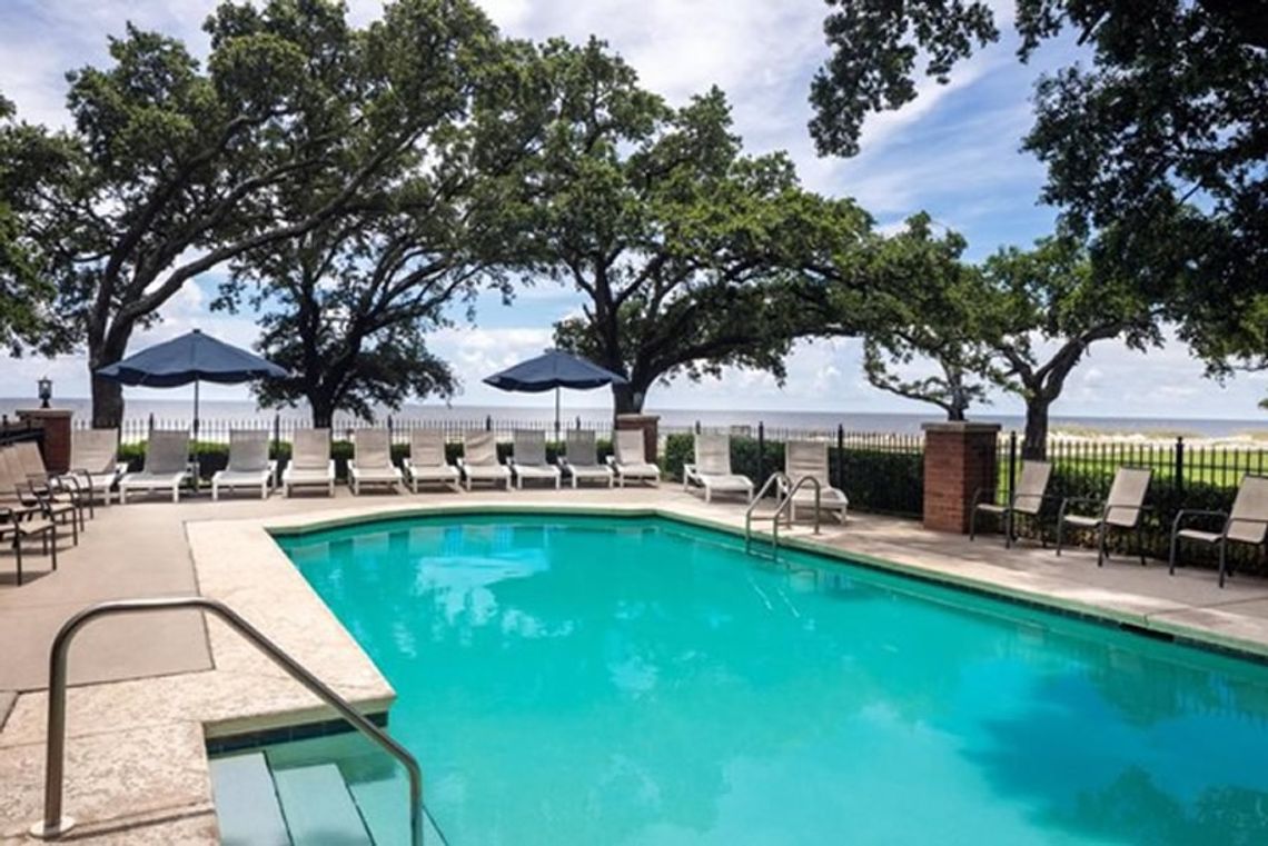 The Inn at Long Beach’s crown jewel – a beachfront pool surrounded by majestic Live Oaks, transported me back to the “old Coast “days.