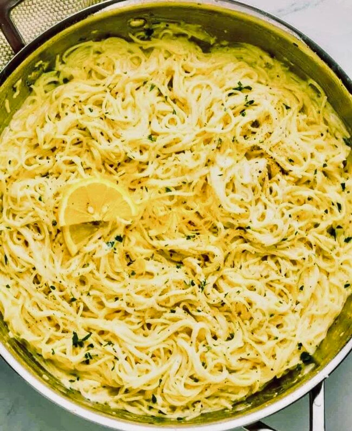 Garlic lemon pasta straight from the skillet is the perfect, easy side for chicken or other main dish and comes together in minutes.