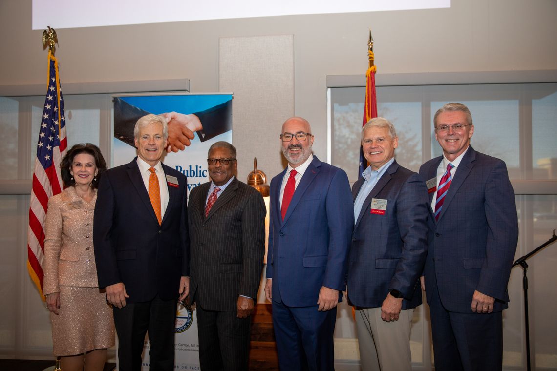 Pictured are MCBL&F Executive Director Jan Collins, MCBL&F Chair John Geary, Commissioner Willie Simmons, MDOT Executive Director Brad White, MCBL&F Transportation Committee Chair Rodney Grogan and MCBL&F Government Affairs Committee Chair Phil Buffington.