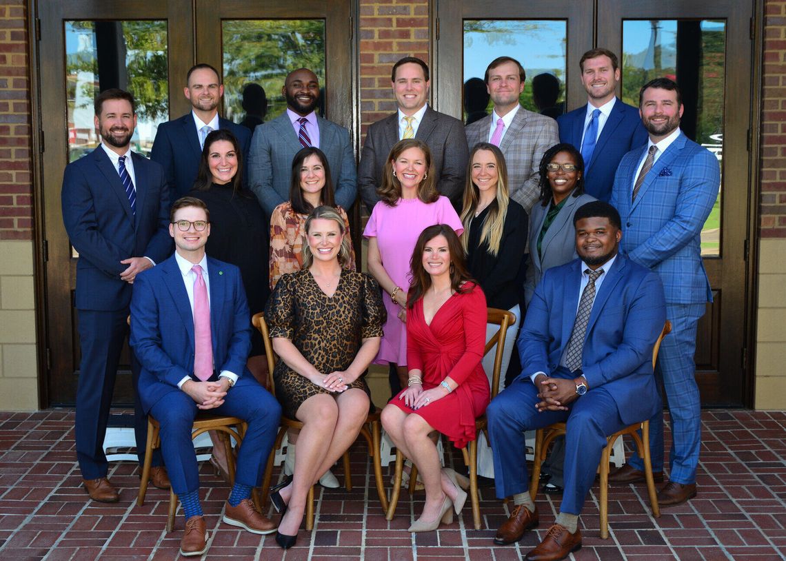 The MCBL&F announces Madison County Young Professionals Board of Directors The Madison County Young Professionals board members, most in suits, pose in three rows in front of a brick wall and large windows